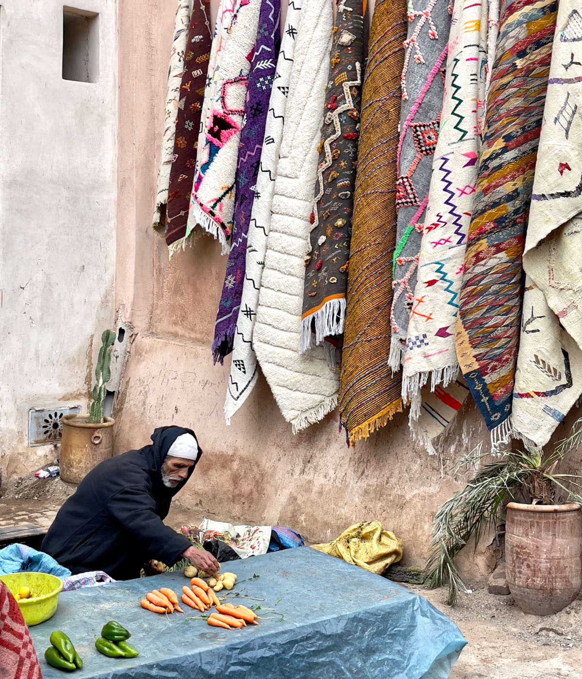 A Moroccan man selling vegetables in the Medina.
